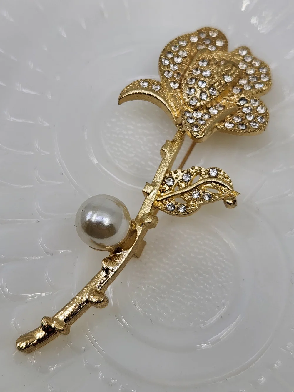 Gold Tone Crystal Rose Brooch with Faux Pearl Accent